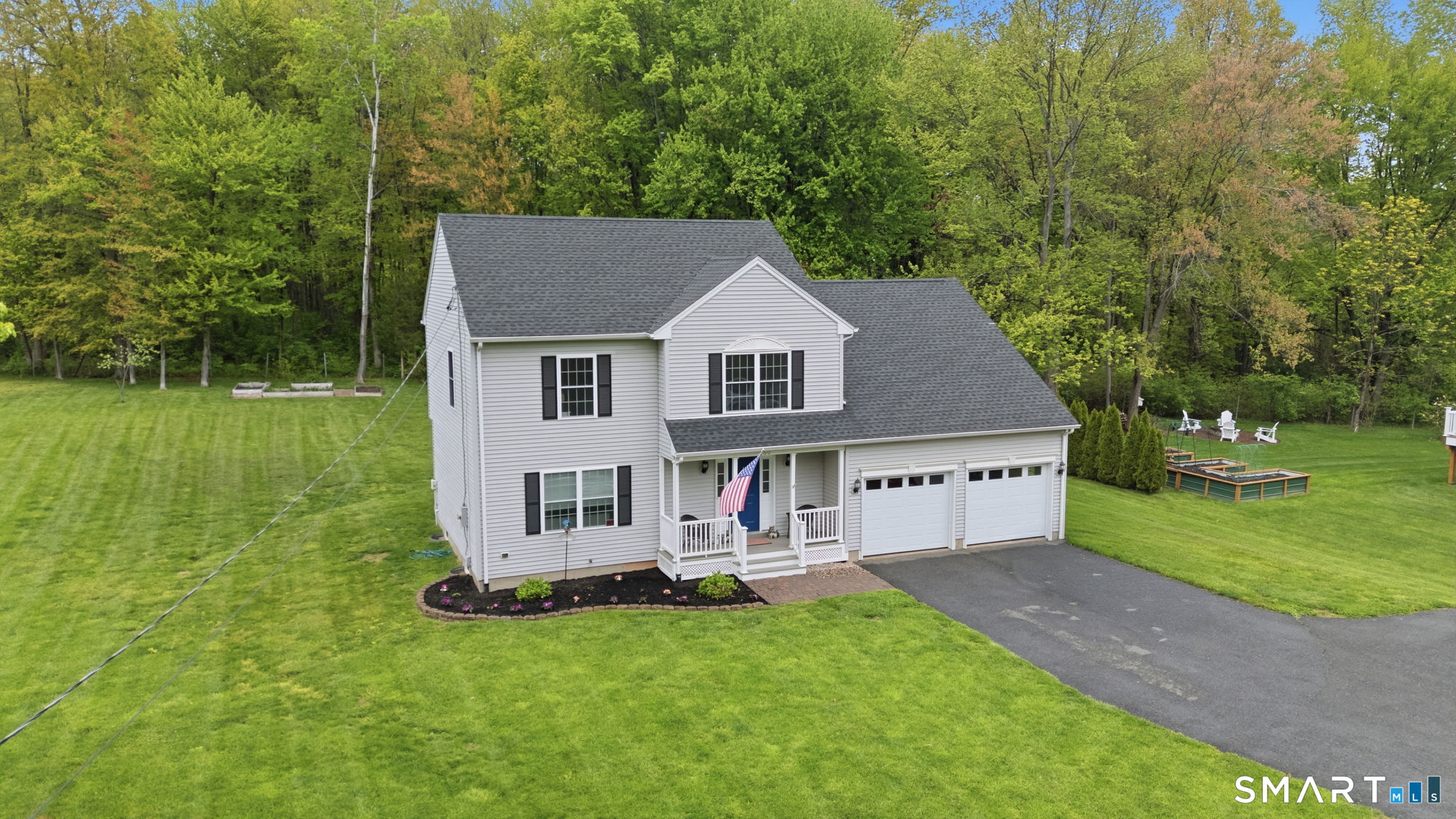 160 Canal Road Suffield, CT 06078 - Photo 3 of 40 front view of a house with a yard