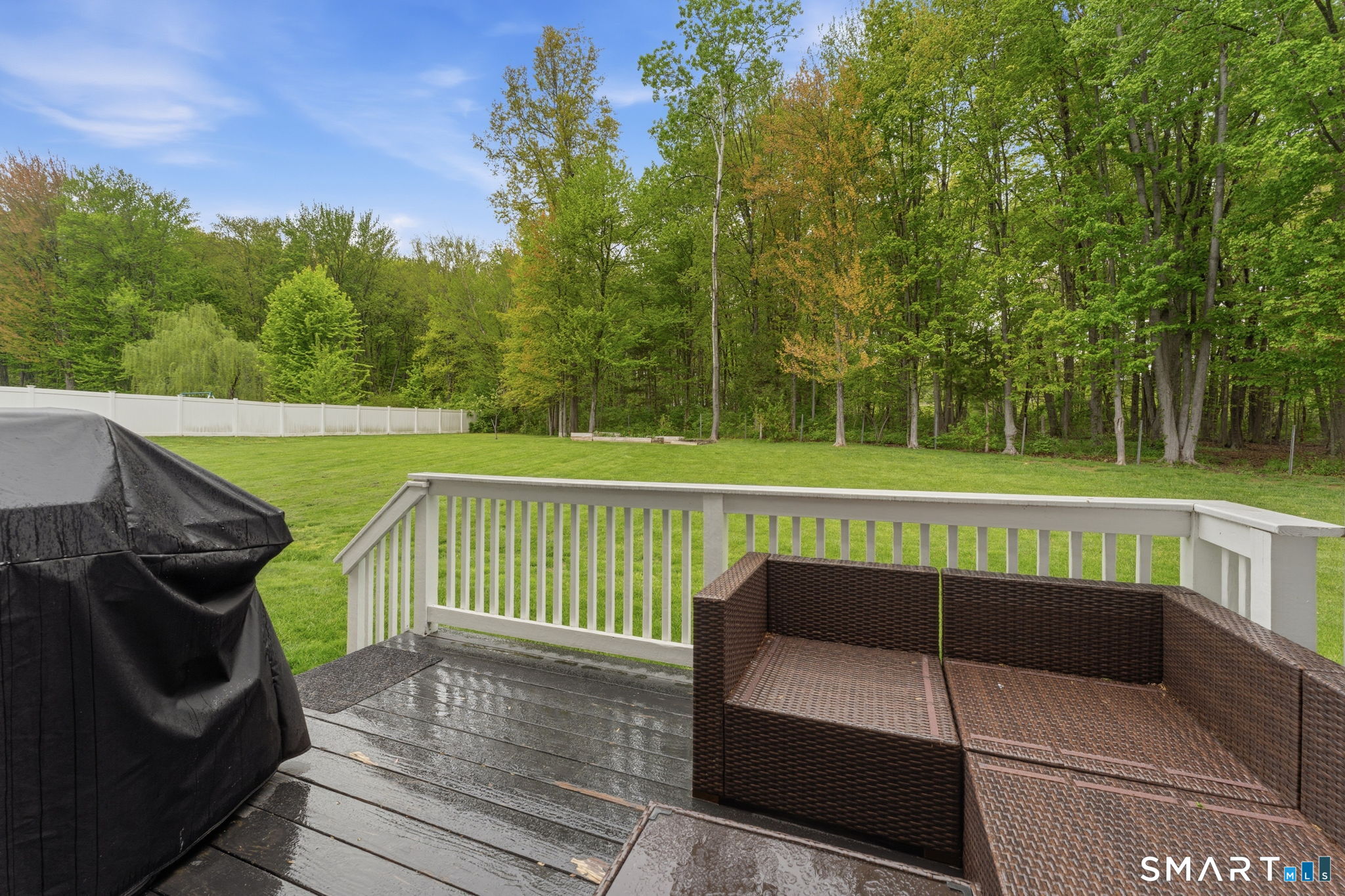 160 Canal Road Suffield, CT 06078 - Photo 35 of 40 a view of a roof deck with couches and wooden floor