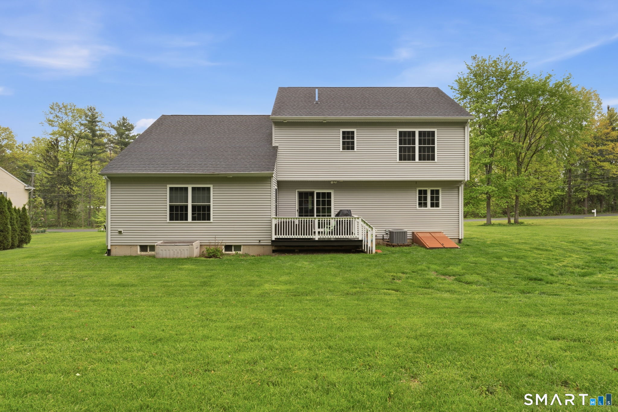 160 Canal Road Suffield, CT 06078 - Photo 36 of 40 a front view of a house with a garden