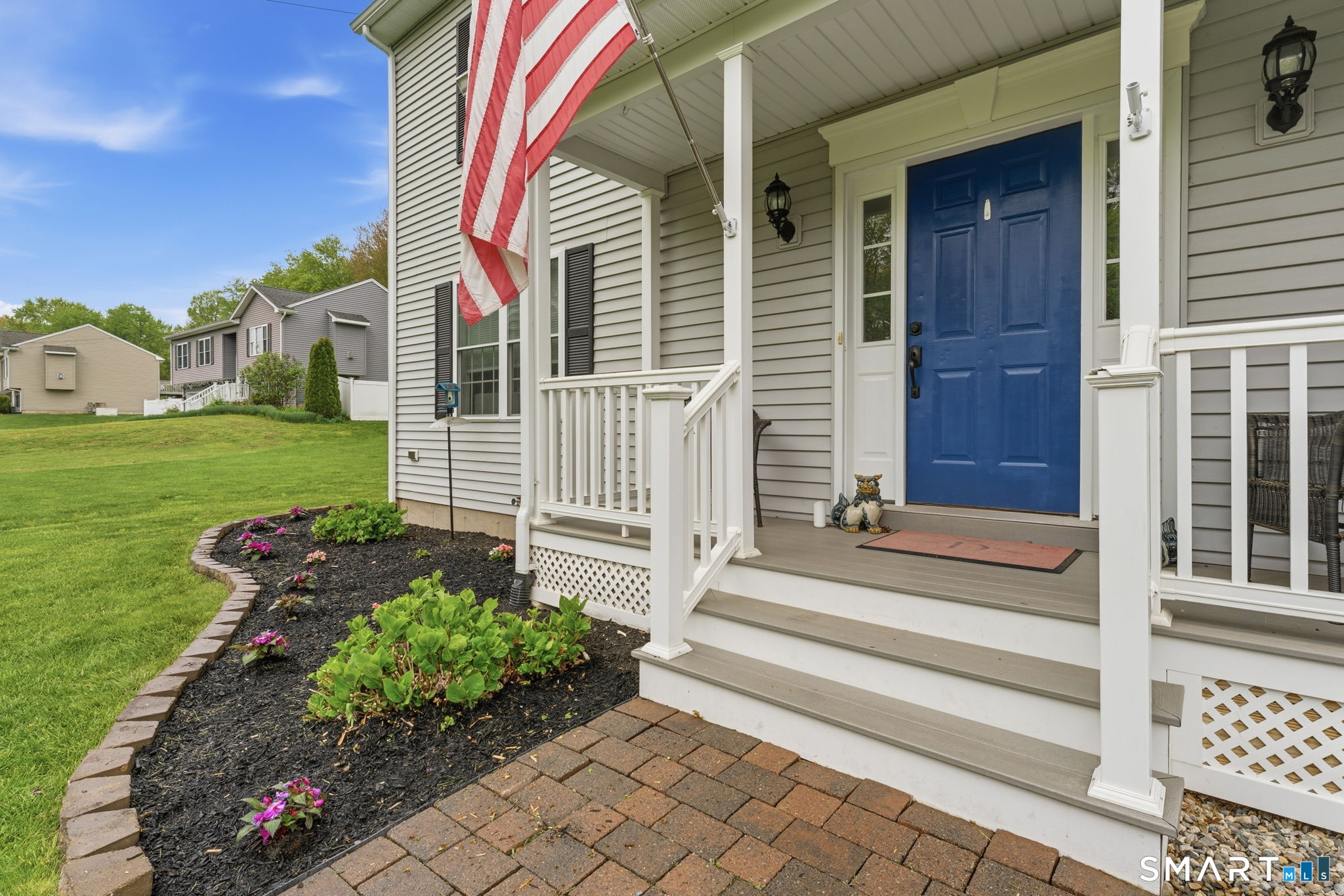 160 Canal Road Suffield, CT 06078 - Photo 4 of 40 a front view of a house with a yard and outdoor seating