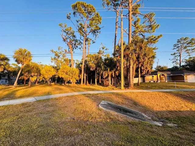 a view of a house with basketball court