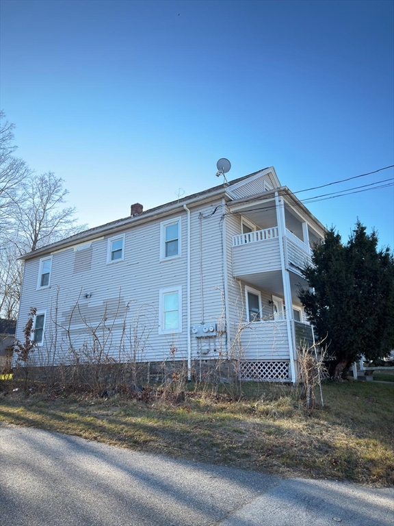 917 Main Street, Unit 2 Southbridge, MA 01550 - Photo 7 of 7 a view of a house with a street