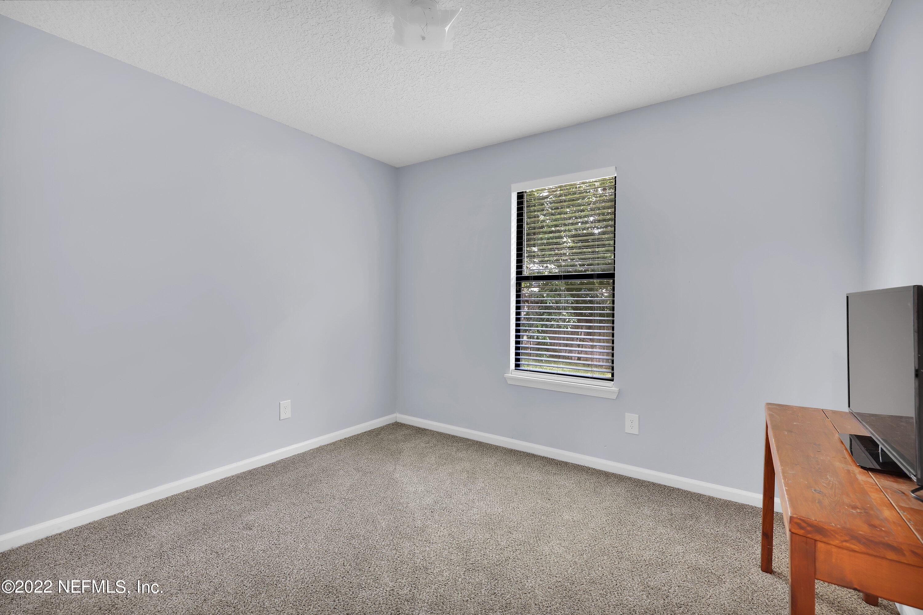 3248 Dowitcher Lane Orange Park, FL 32065 - Photo 12 of 26 a view of an empty room with a window