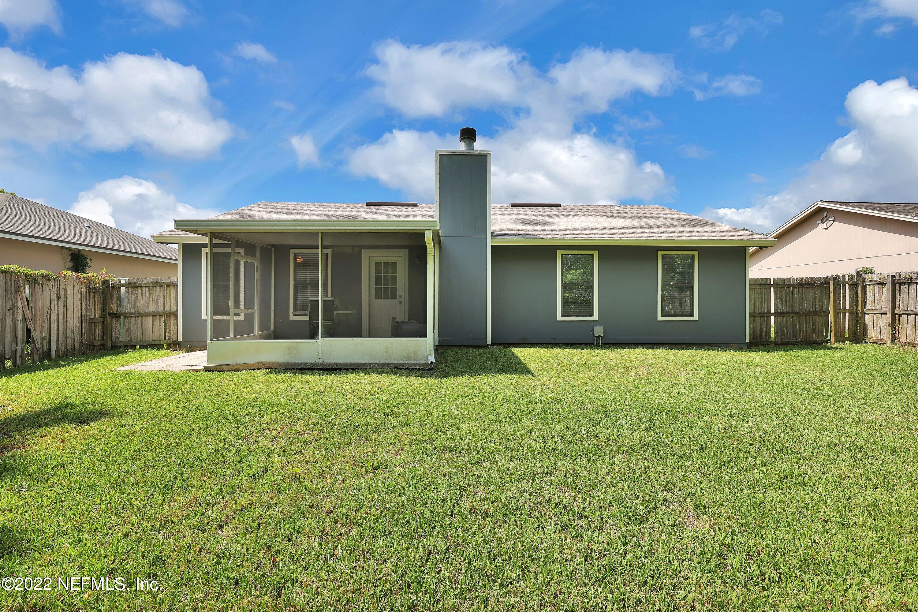 3248 Dowitcher Lane Orange Park, FL 32065 - Photo 19 of 26 a house view with a garden space