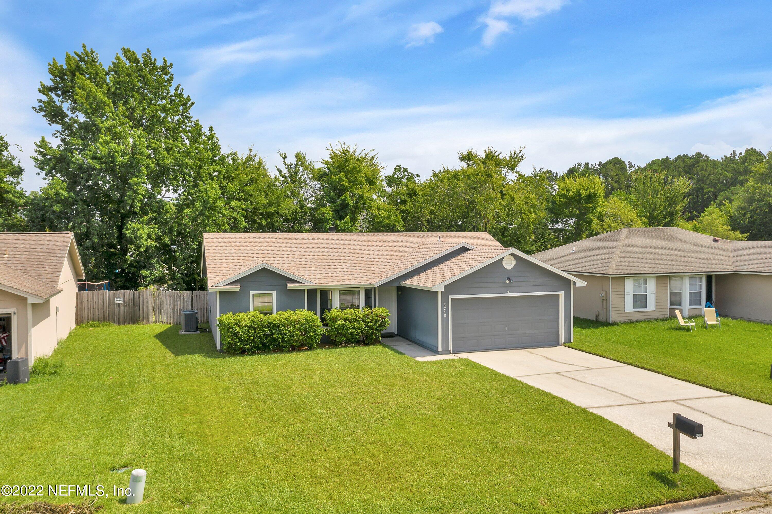 3248 Dowitcher Lane Orange Park, FL 32065 - Photo 23 of 26 a view of house with garden