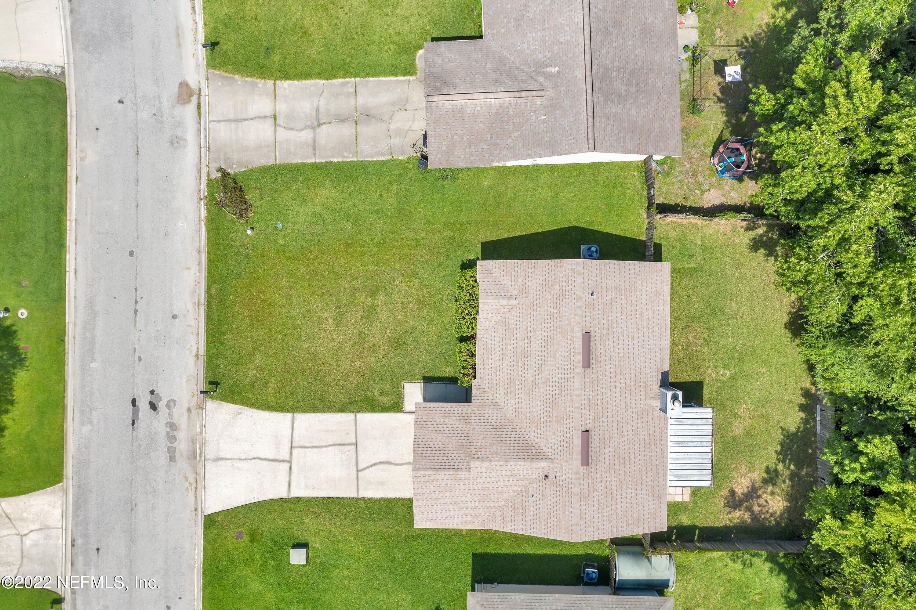 3248 Dowitcher Lane Orange Park, FL 32065 - Photo 25 of 26 an aerial view of a house with a yard