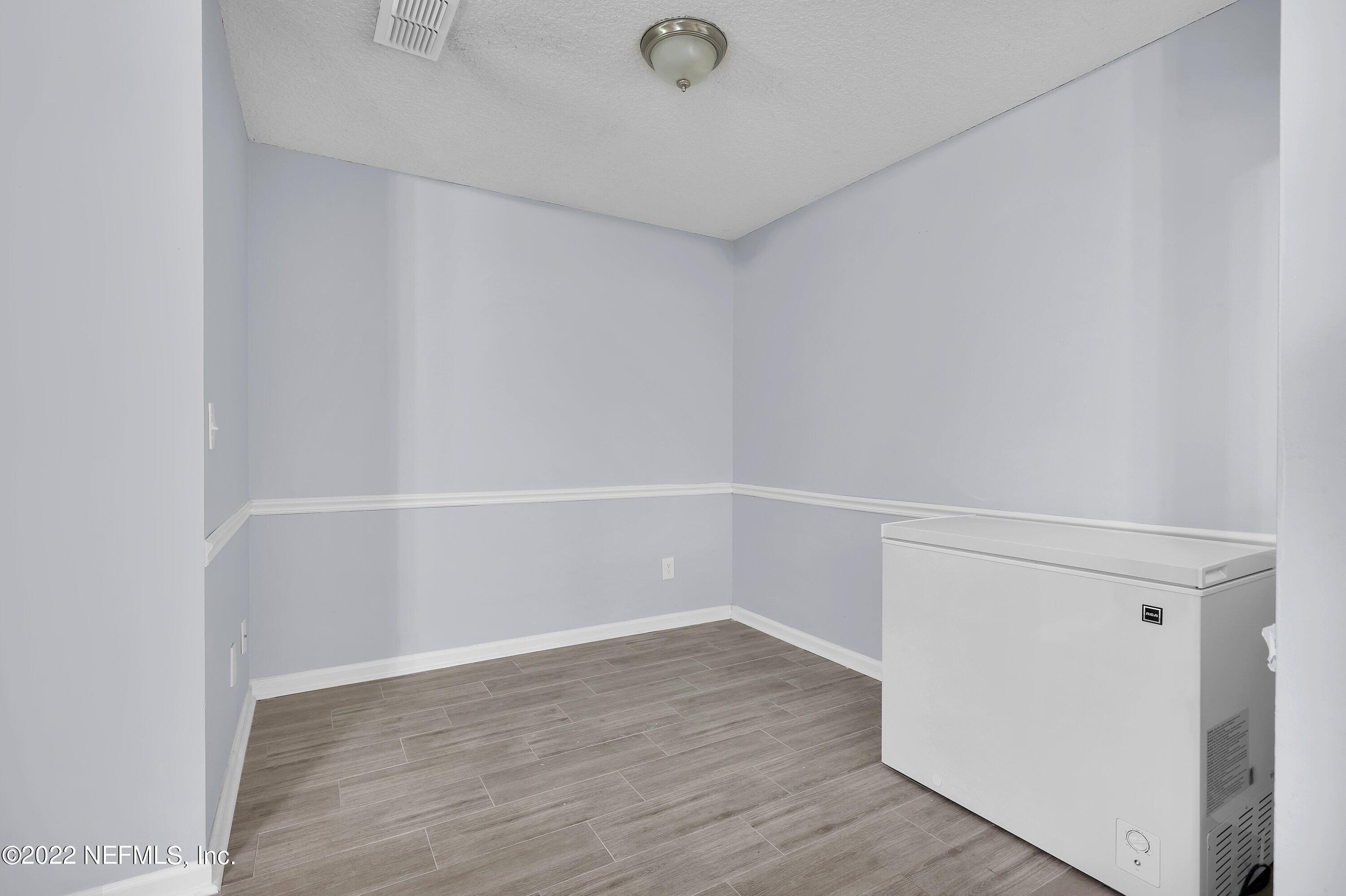 3248 Dowitcher Lane Orange Park, FL 32065 - Photo 8 of 26 a view of an empty walk in closet