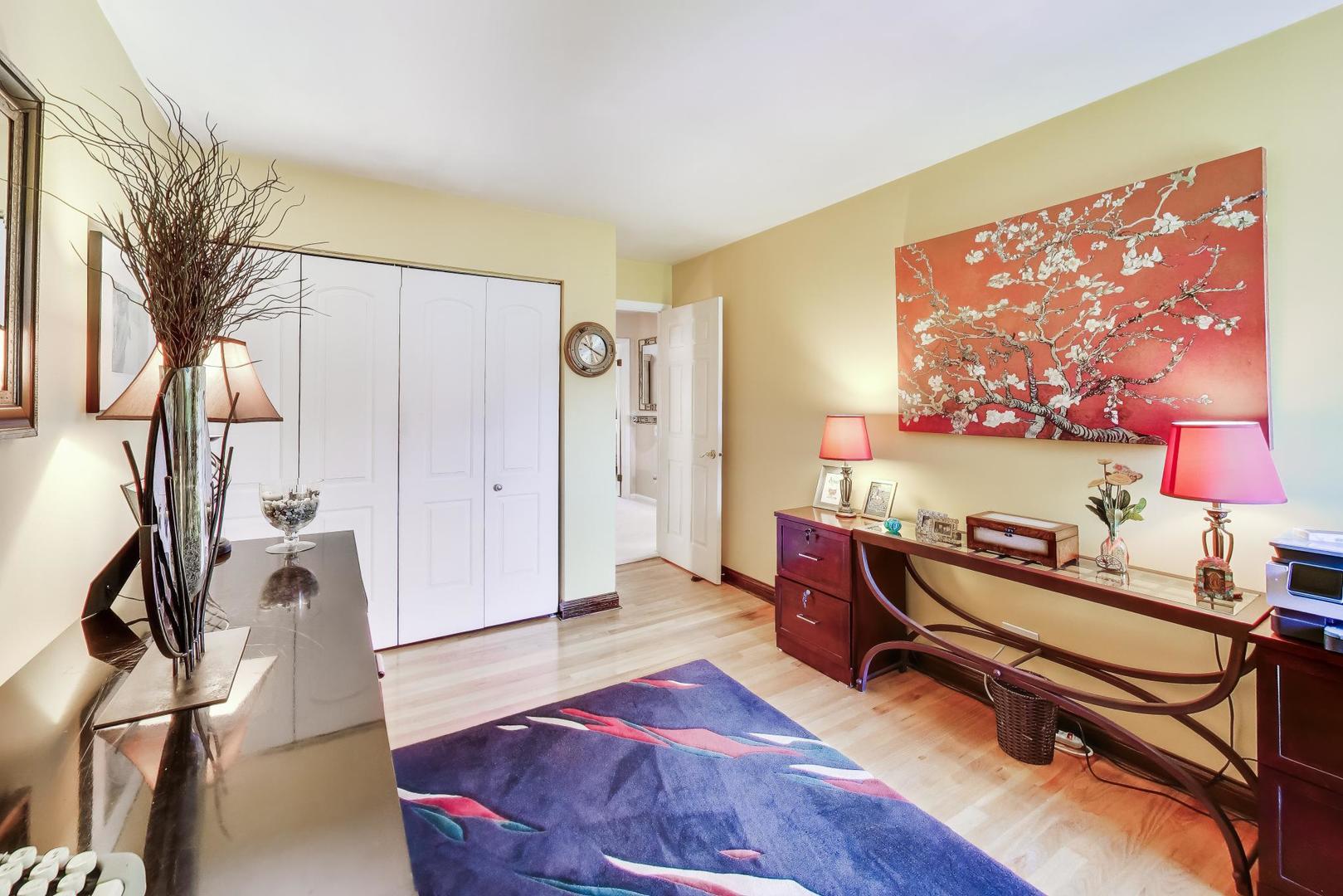 1 Maple Tree Court Elmhurst, IL 60126 - Photo 19 of 34 a room with furniture and a wooden floor
