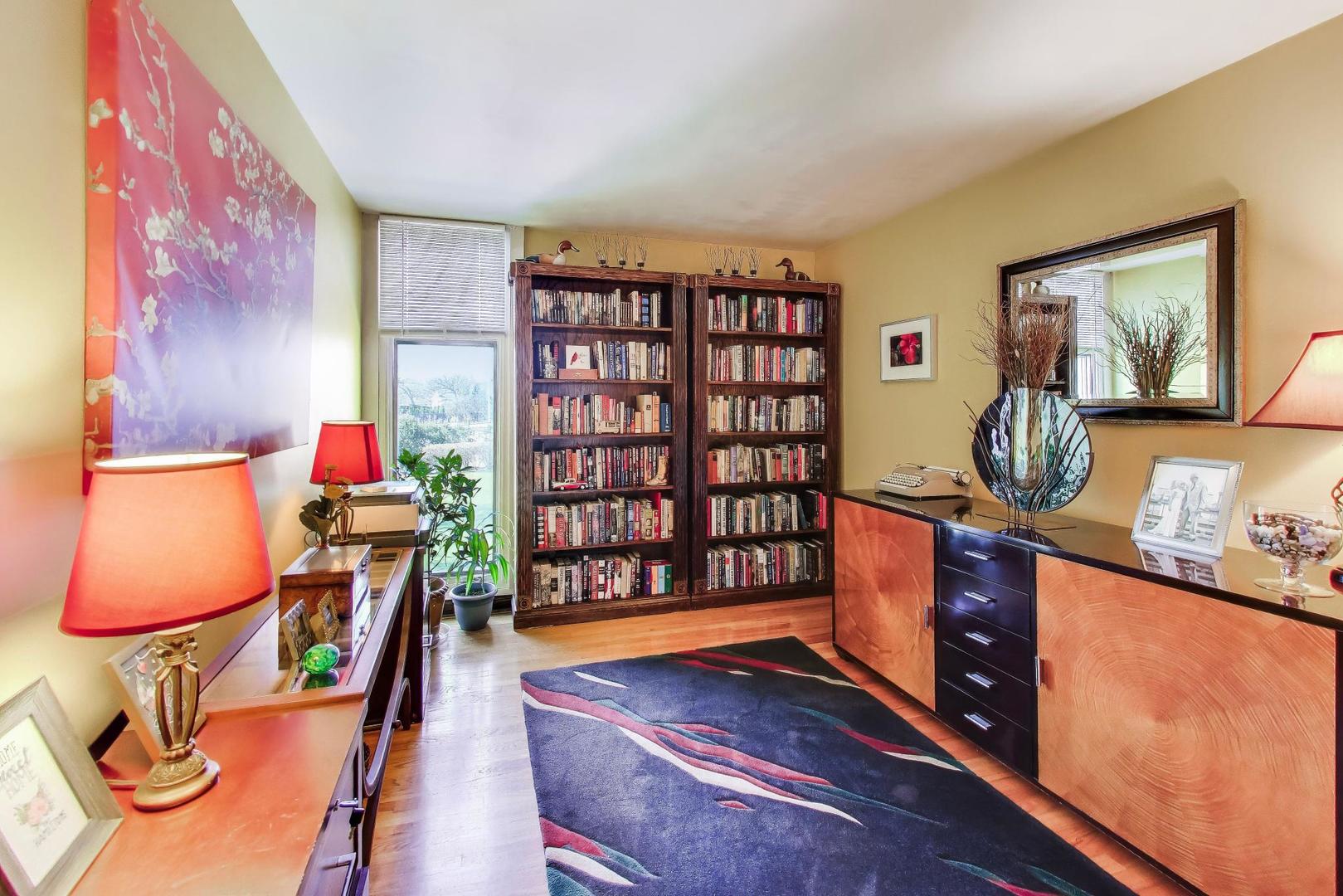1 Maple Tree Court Elmhurst, IL 60126 - Photo 20 of 34 a room with furniture and book shelf