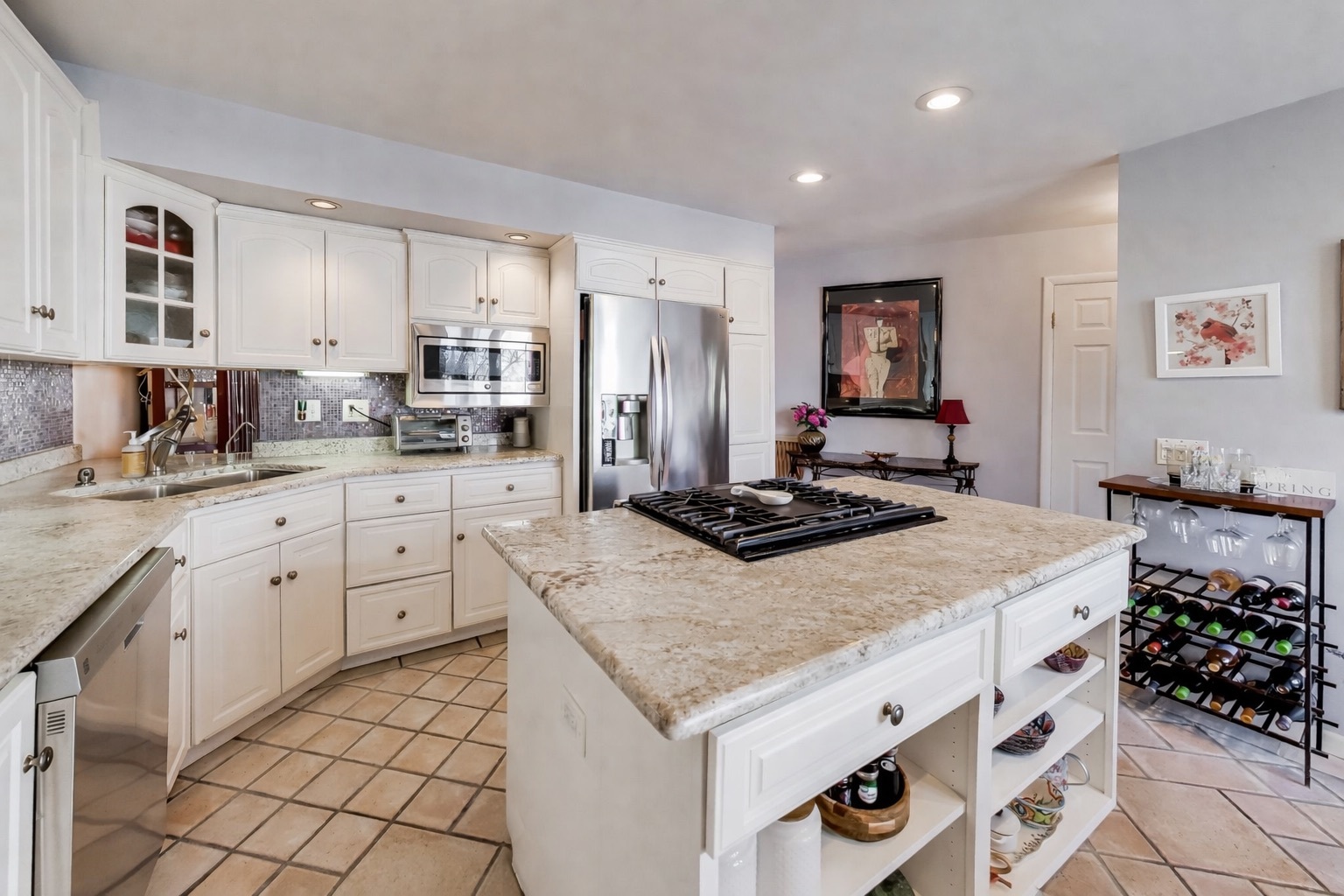 1 Maple Tree Court Elmhurst, IL 60126 - Photo 2 of 34 a kitchen with a sink stove and cabinets