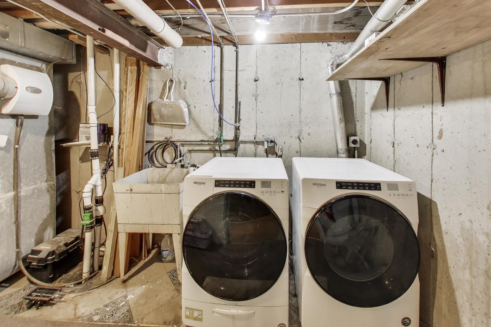 1 Maple Tree Court Elmhurst, IL 60126 - Photo 24 of 34 a utility room with dryer and washer