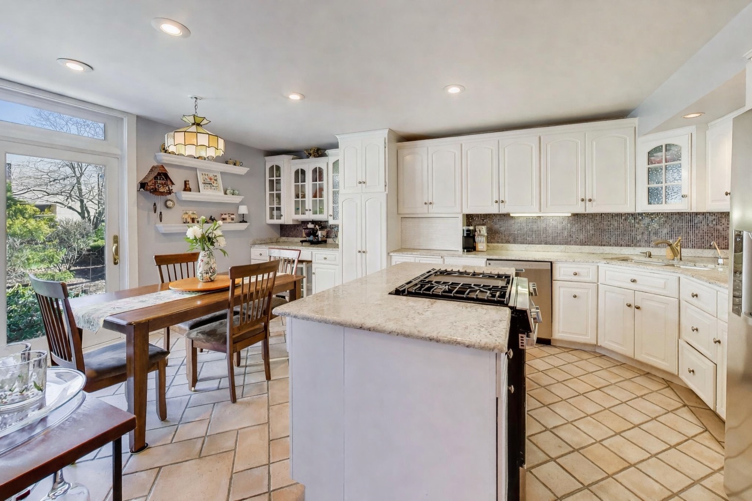 1 Maple Tree Court Elmhurst, IL 60126 - Photo 3 of 34 a kitchen with a stove a sink dishwasher and a refrigerator