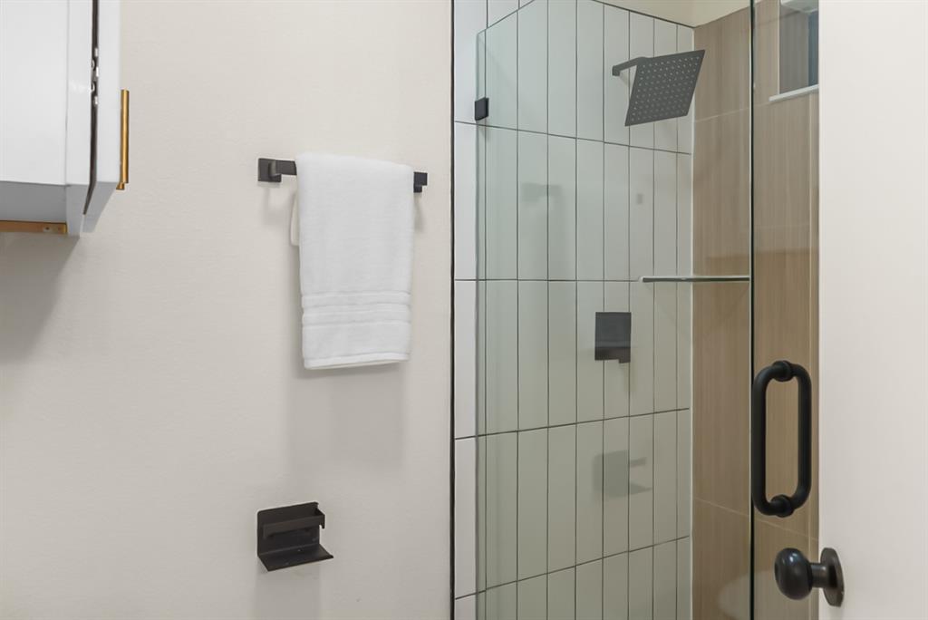 13103 Halwin Circle Dallas, TX 75243 - Photo 11 of 15 Full bathroom with a shower stall
