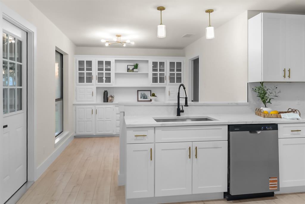 13103 Halwin Circle Dallas, TX 75243 - Photo 5 of 15 Living room featuring light wood-style floors, a brick fireplace, and vaulted ceiling