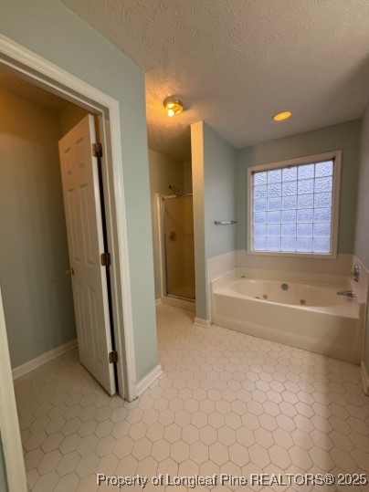 1135 Derbyshire Road Fayetteville, NC 28314 - Photo 12 of 22 a bathroom with a bathtub and a shower