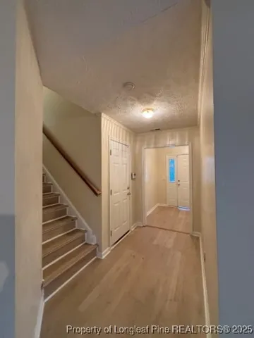 a view of an entryway with stairs