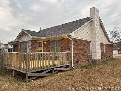 1135 Derbyshire Road Fayetteville, NC 28314 - Photo 22 of 22 a view of a house with a yard