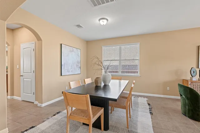 a kitchen with stainless steel appliances granite countertop a sink dishwasher stove and cabinets