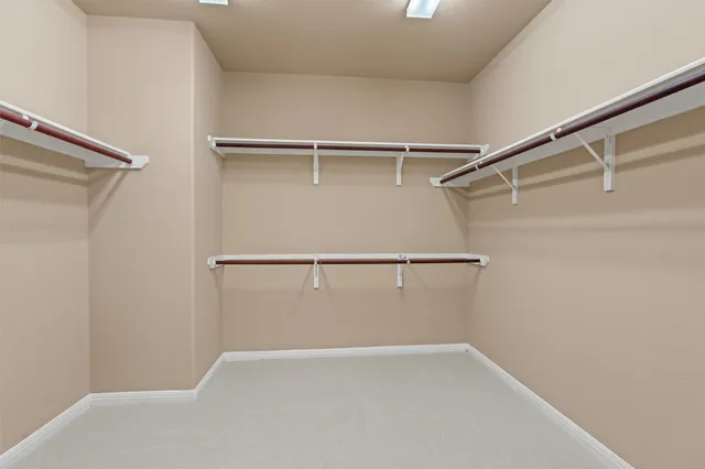 a bathroom with a bath tub and shower