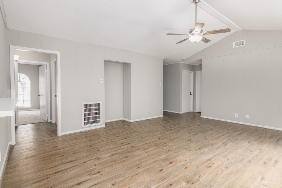 92 Sparrow Way Beaumont, TX 77707 - Photo 5 of 19 a view of an empty room with wooden floor