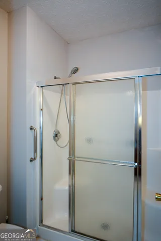 a view of a room with racks on the wall