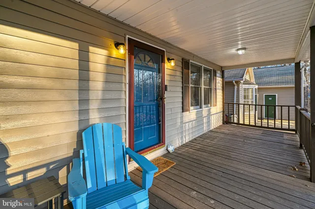 a view of balcony with wooden floor