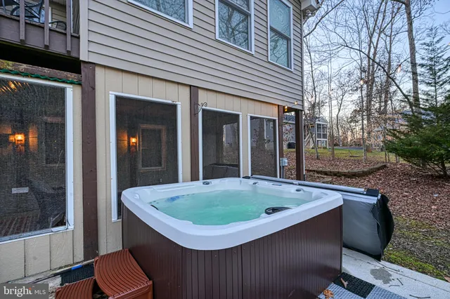 a view of a house with tub and tree s