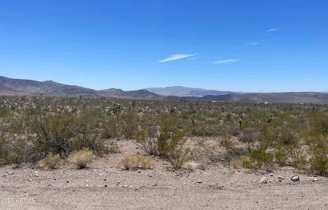 a view of a mountain with a outdoor space