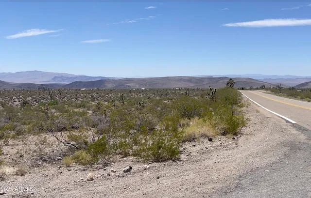 a view of a lake with mountains in the background