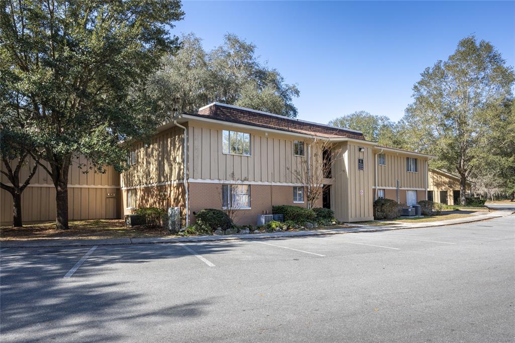 507 Northwest 39th Road, Unit 133 Gainesville, FL 32607 - Photo 1 of 1 front of building and parking - unit is lower left