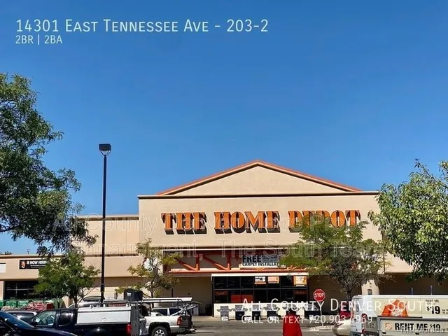 a view of a building with traffic signal lights