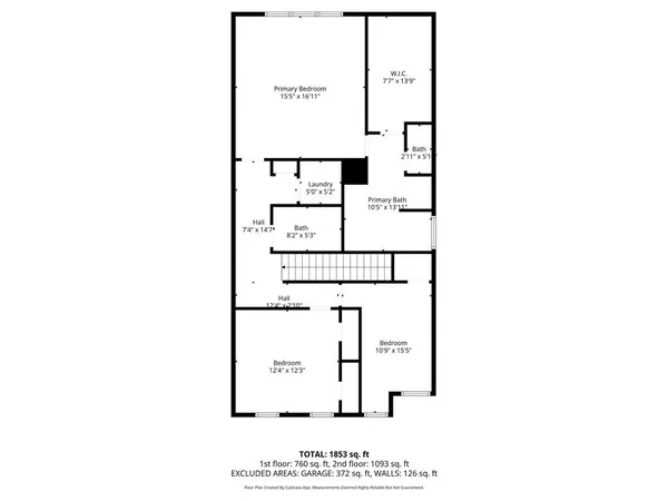 a picture of a bench in front of a wall