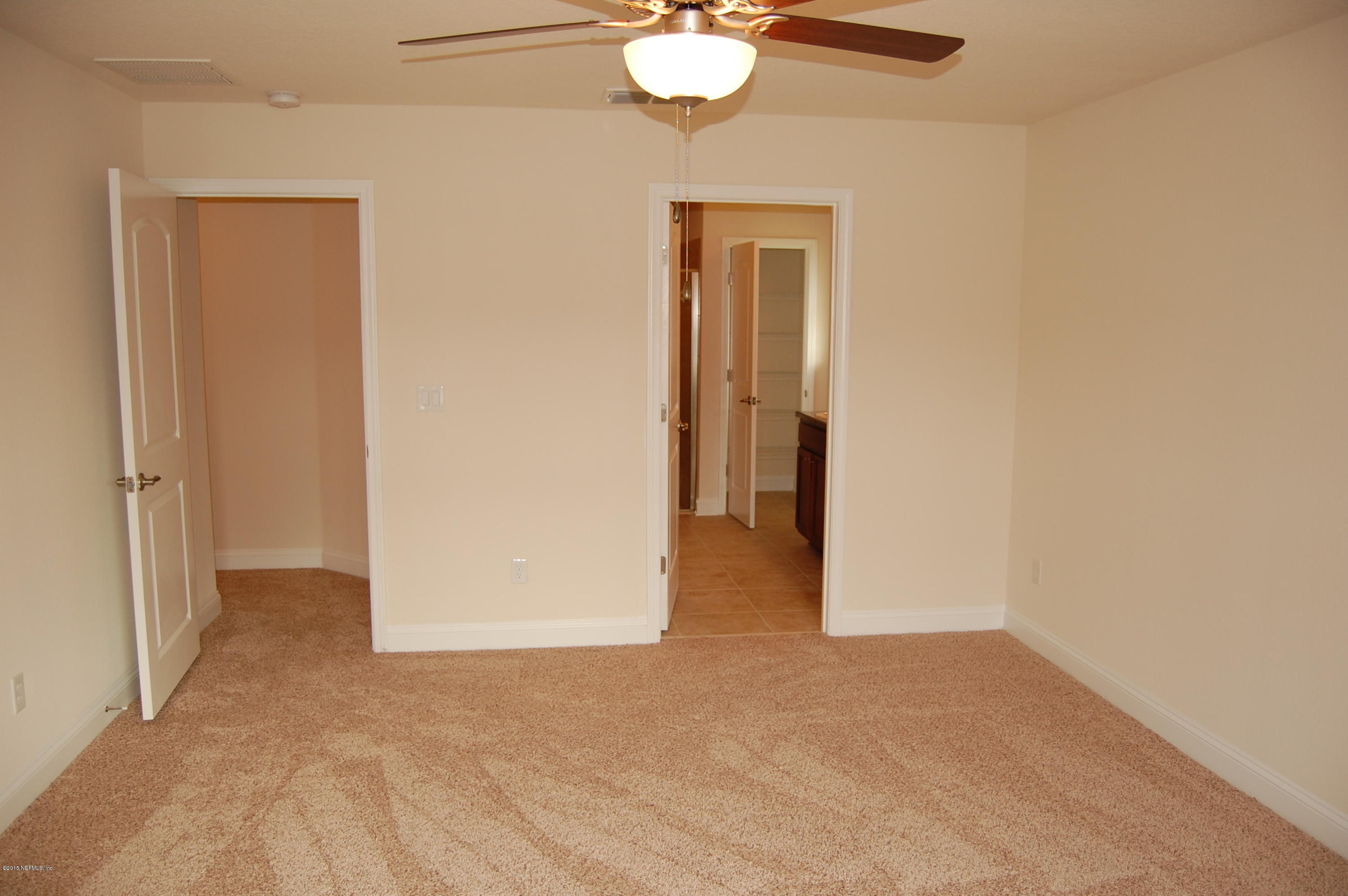 8000 Capeside Way Jacksonville, FL 32222 - Photo 19 of 32 a view of a livingroom with an empty space