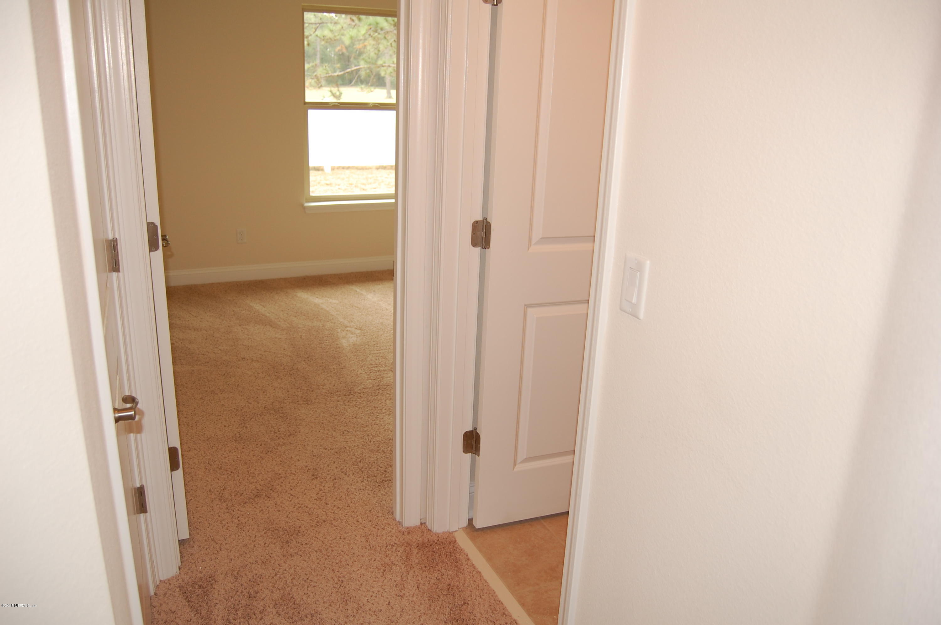 8000 Capeside Way Jacksonville, FL 32222 - Photo 24 of 32 a bathroom with a shower