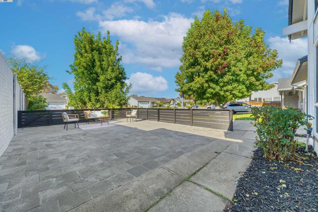 a view of backyard with green space