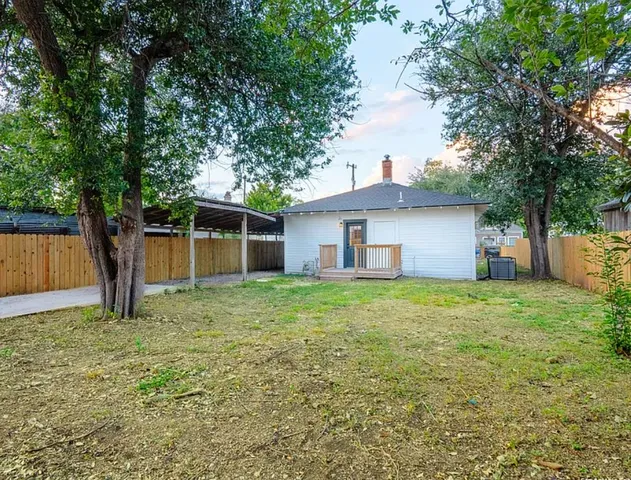 a fire hydrant in the middle of a field