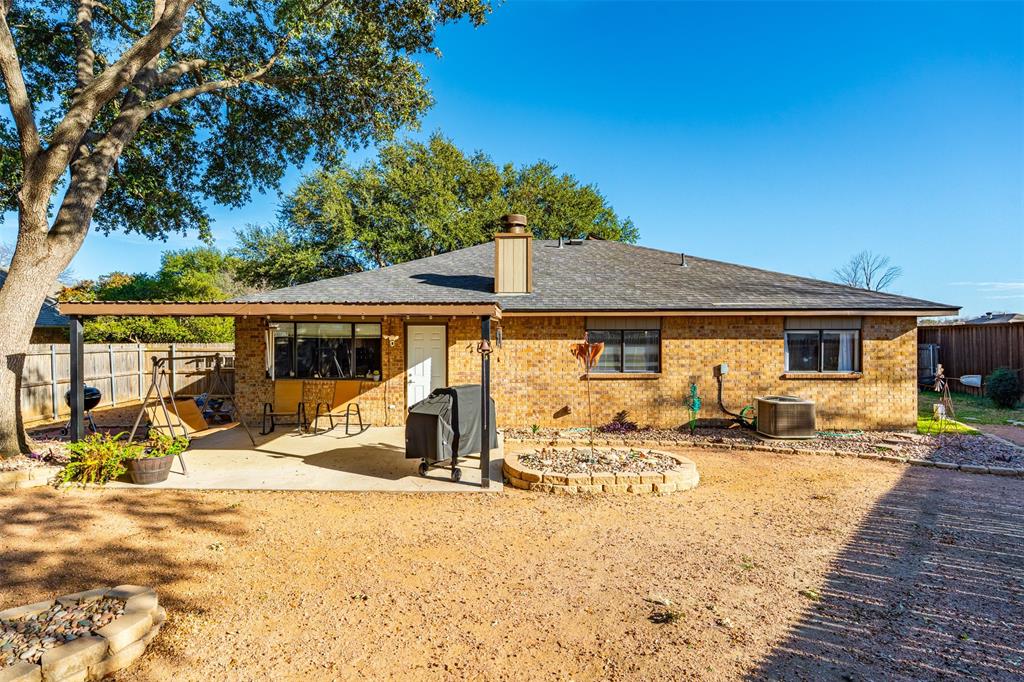 10159 Powderhorn Road Fort Worth, TX 76108 - Photo 19 of 21 a front view of a house with a patio