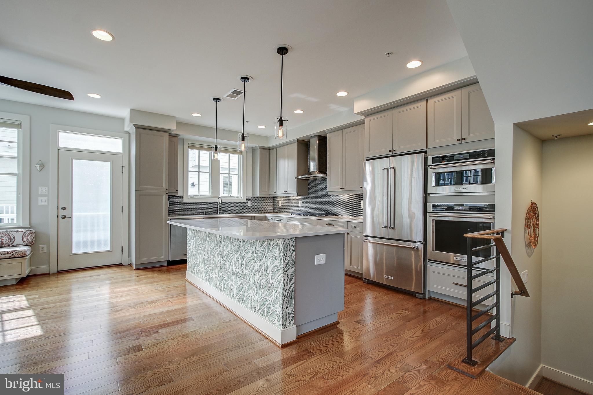 44 Ellsworth Heights Street Silver Spring, MD 20910 - Photo 14 of 42 Large island with quartz countertops