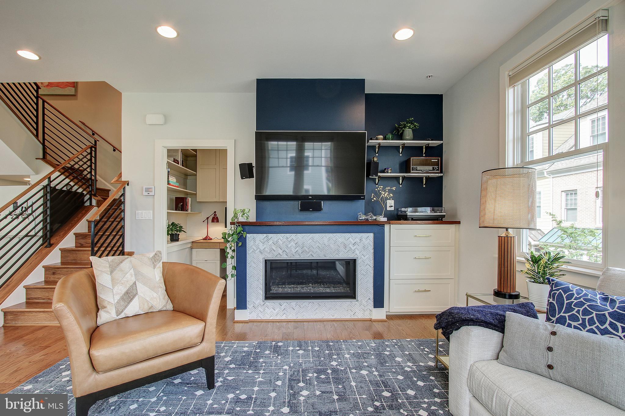 44 Ellsworth Heights Street Silver Spring, MD 20910 - Photo 25 of 42 Living room with fireplace and built-ins