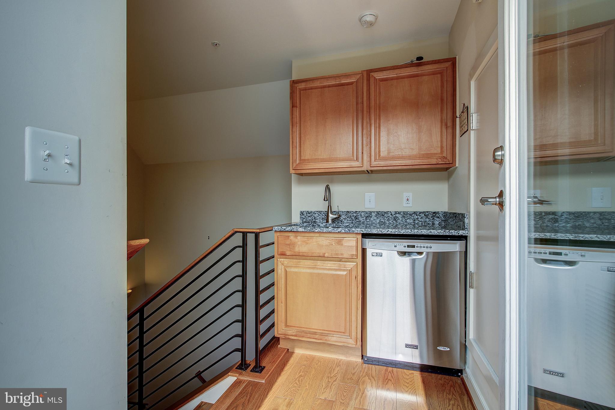 44 Ellsworth Heights Street Silver Spring, MD 20910 - Photo 39 of 42 Upper level wet bar with dishwasher