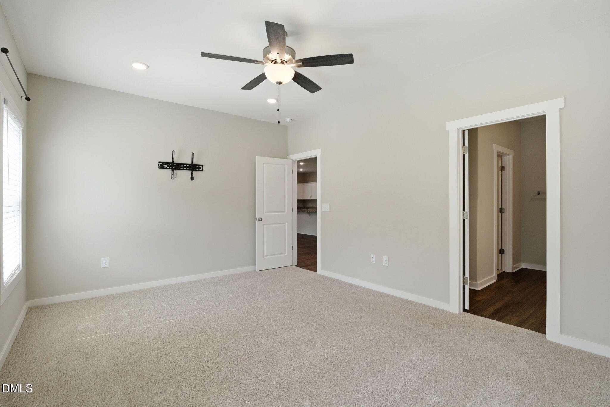 161 Tupelo Dr Spring Spring Hope, NC 27882 - Photo 15 of 28 a view of a livingroom with a ceiling fan and window