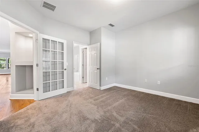 an empty room with windows