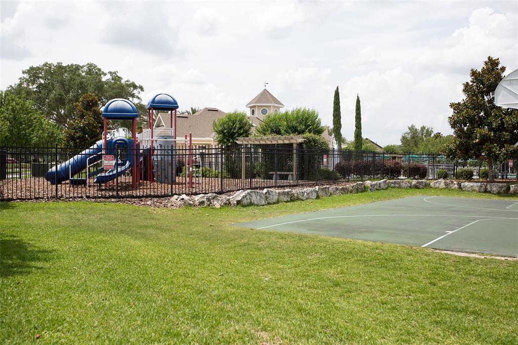 8376 Southwest 80th Place Gainesville, FL 32608 - Photo 35 of 37 a view of a playground with basketball court