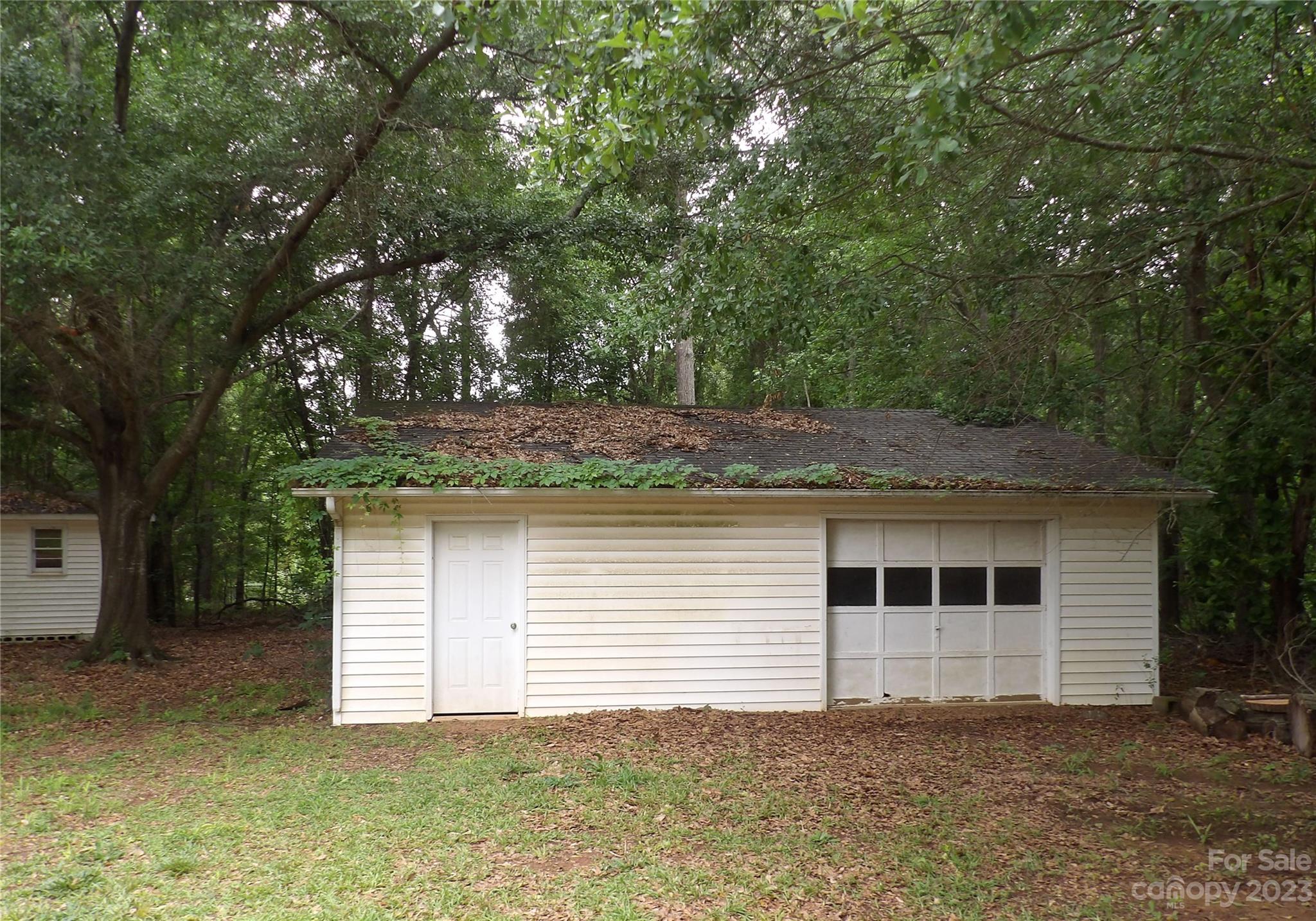 660 Faith Street Lancaster, SC 29720 - Photo 11 of 23 a house that has a tree in front of it