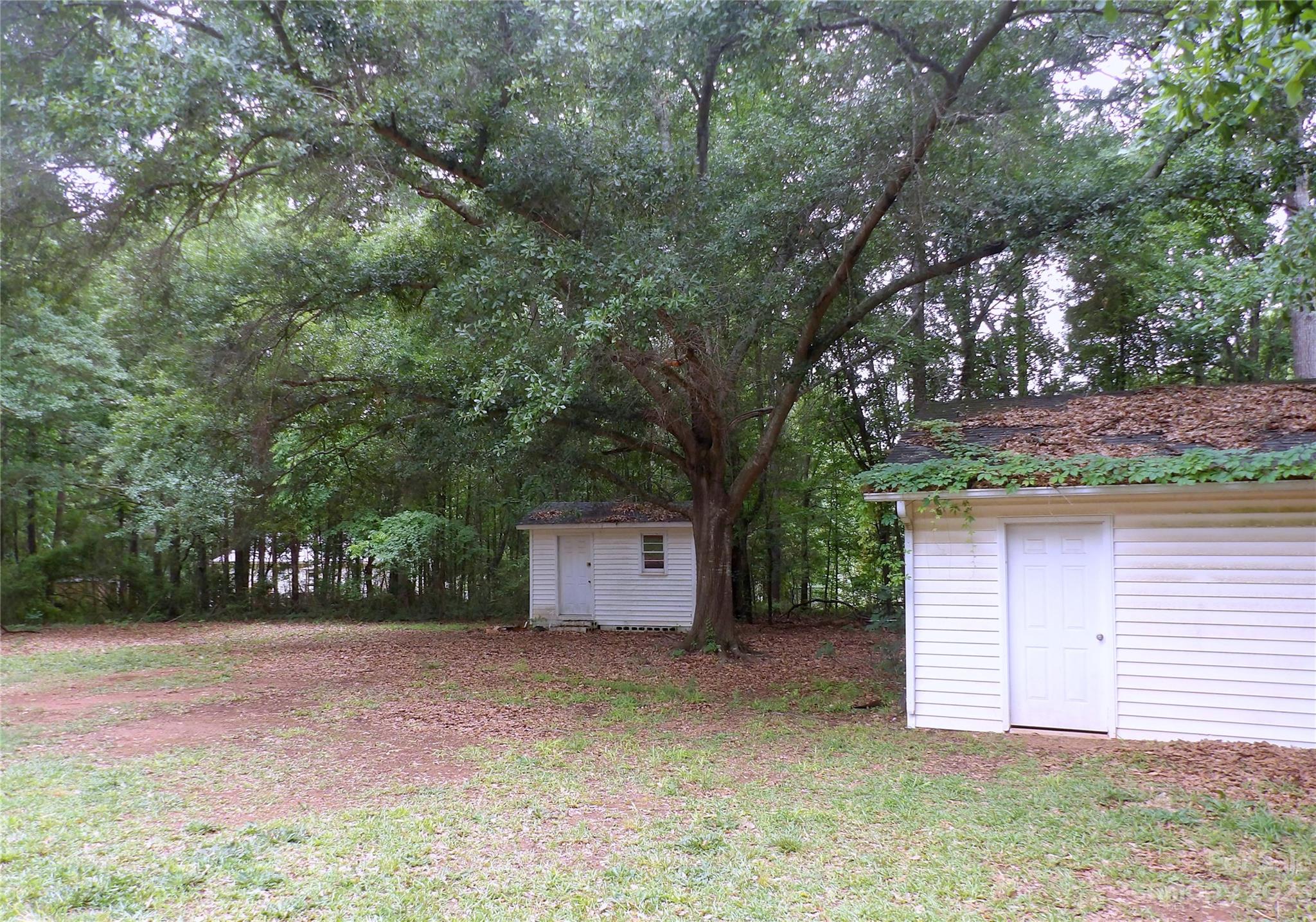 660 Faith Street Lancaster, SC 29720 - Photo 12 of 23 a backyard of a house with lots of green space