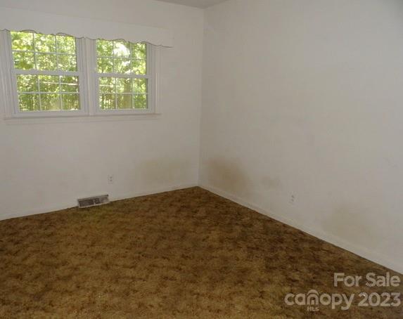 660 Faith Street Lancaster, SC 29720 - Photo 4 of 23 an empty room with a window