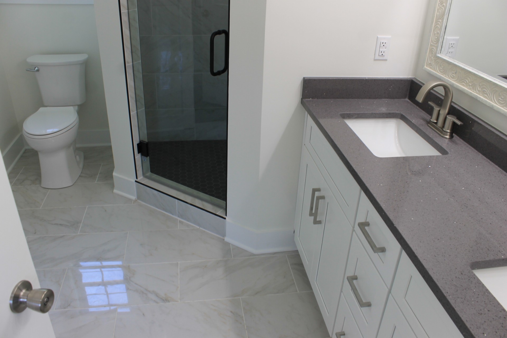673 Shelton Road Manchester, TN 37355 - Photo 18 of 25 a bathroom with a sink a toilet and shower