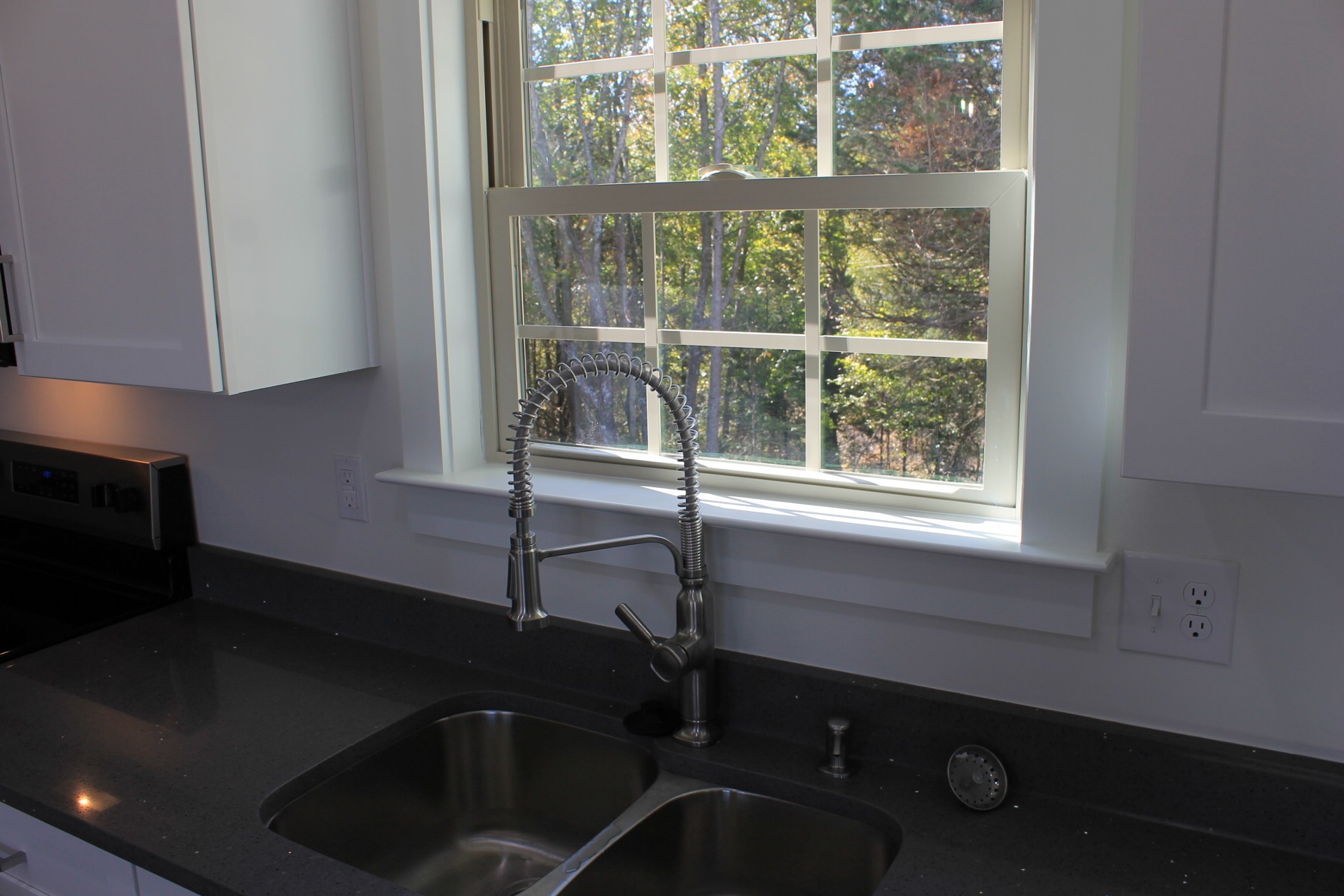 673 Shelton Road Manchester, TN 37355 - Photo 7 of 25 a kitchen with a sink a window and cabinets