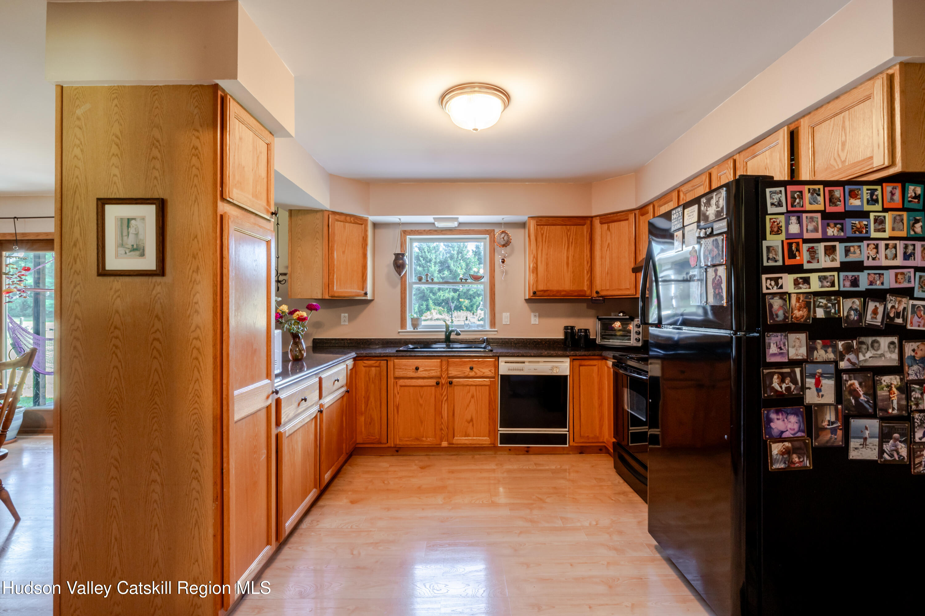 23 Maple Lane Copake Falls, NY 12517 - Photo 12 of 40 a kitchen with stainless steel appliances granite countertop a refrigerator and a stove top oven