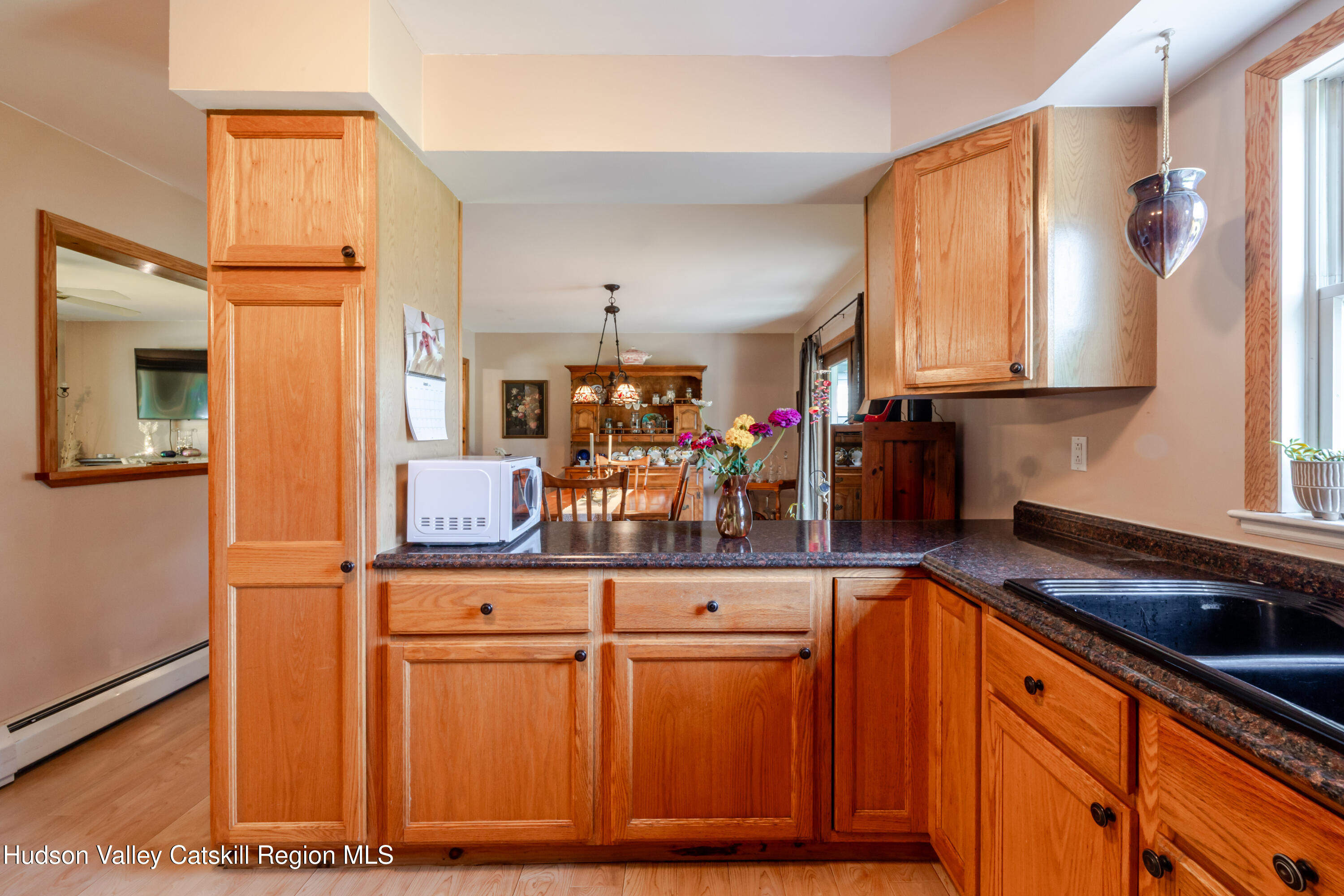 23 Maple Lane Copake Falls, NY 12517 - Photo 13 of 40 a kitchen with stainless steel appliances granite countertop a refrigerator and a sink